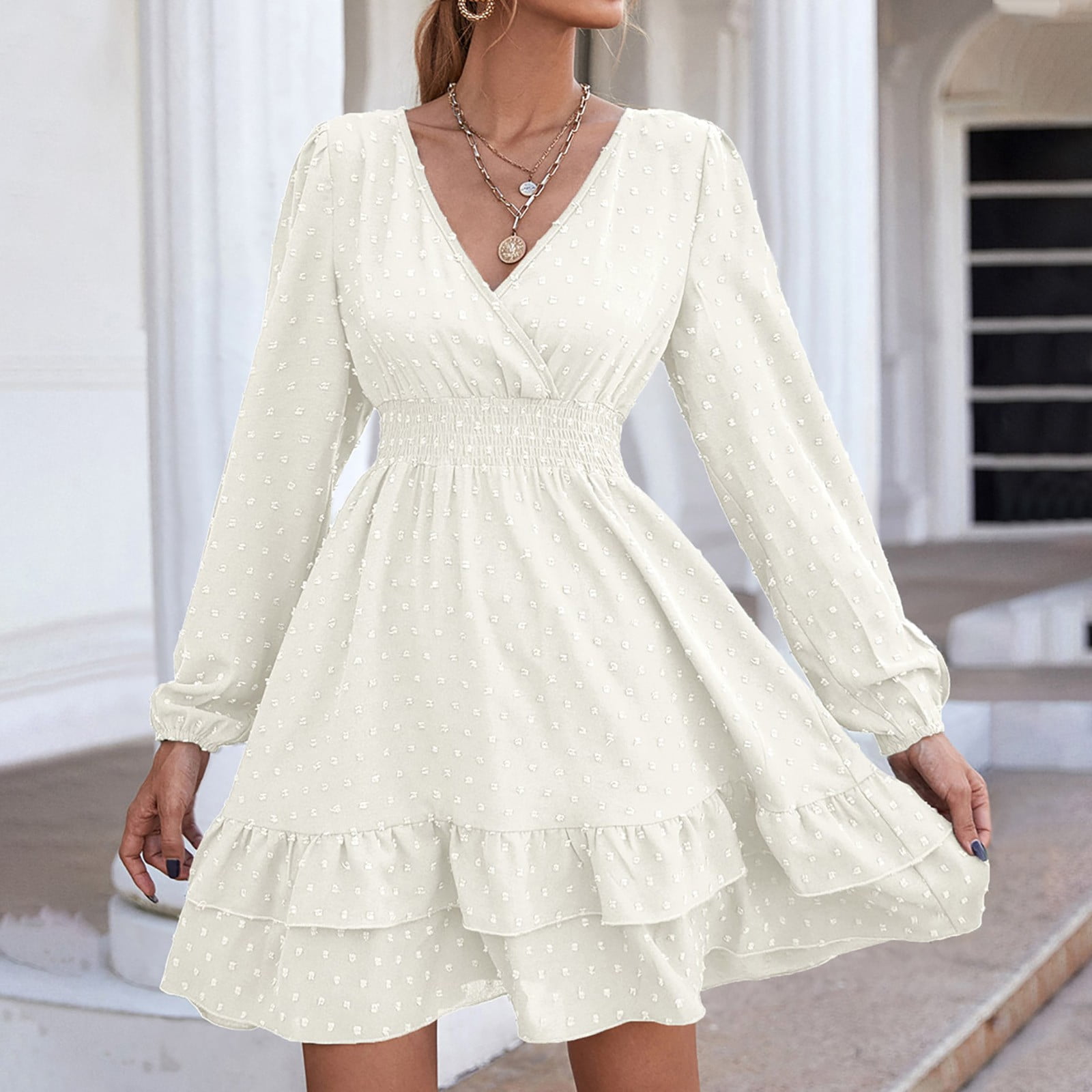 white flowy dress with sleeves
